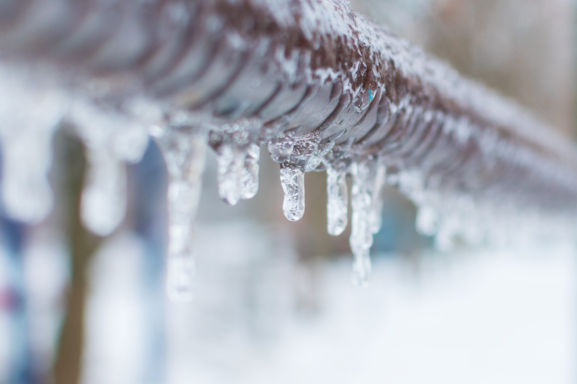 frozen-icicles-after-rain-on-the-pipe-prevent-frozen-pipes